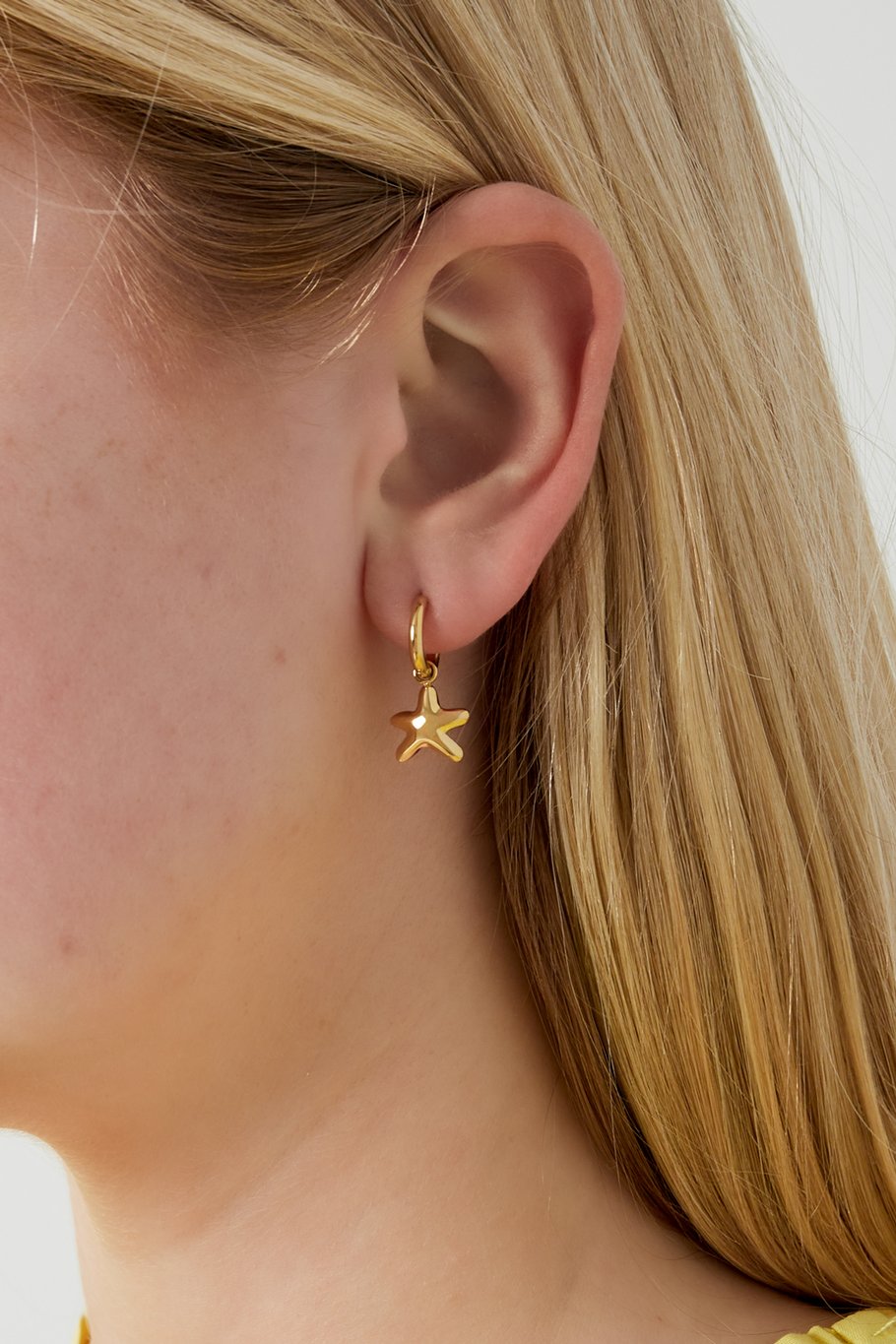 Mini seastar earrings gold