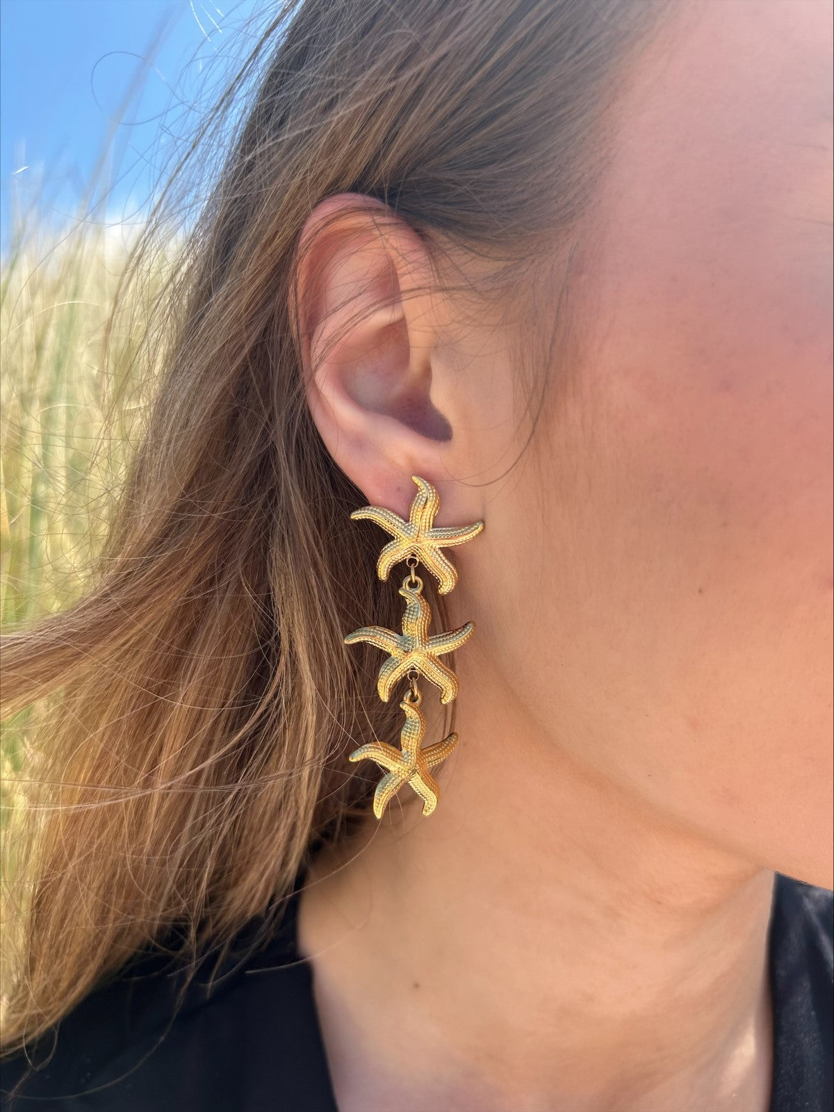 Seastar earrings gold