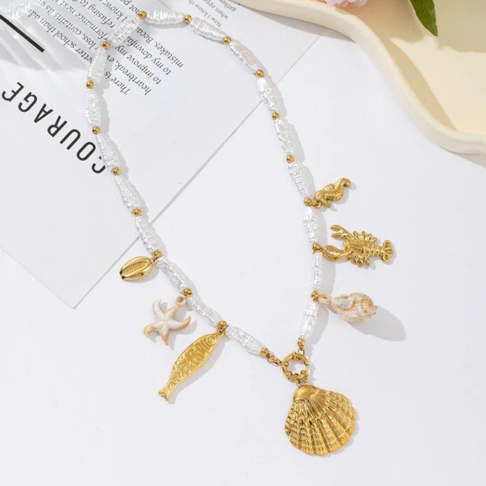 Seastar pearl necklace gold.