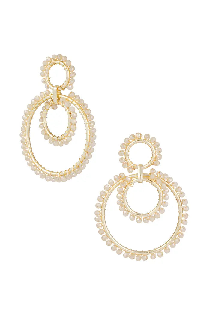 Shimmering earrings beige gold